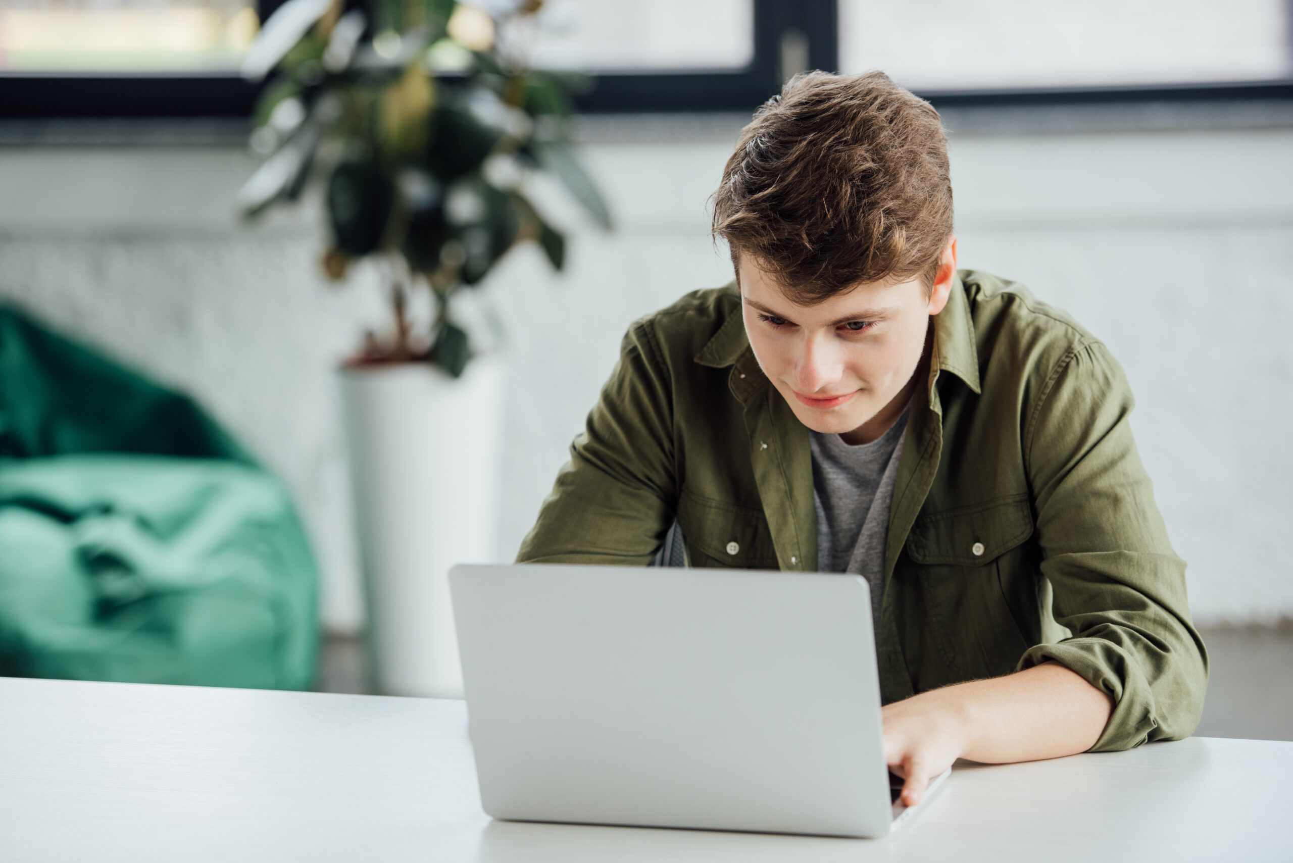 teen on laptop